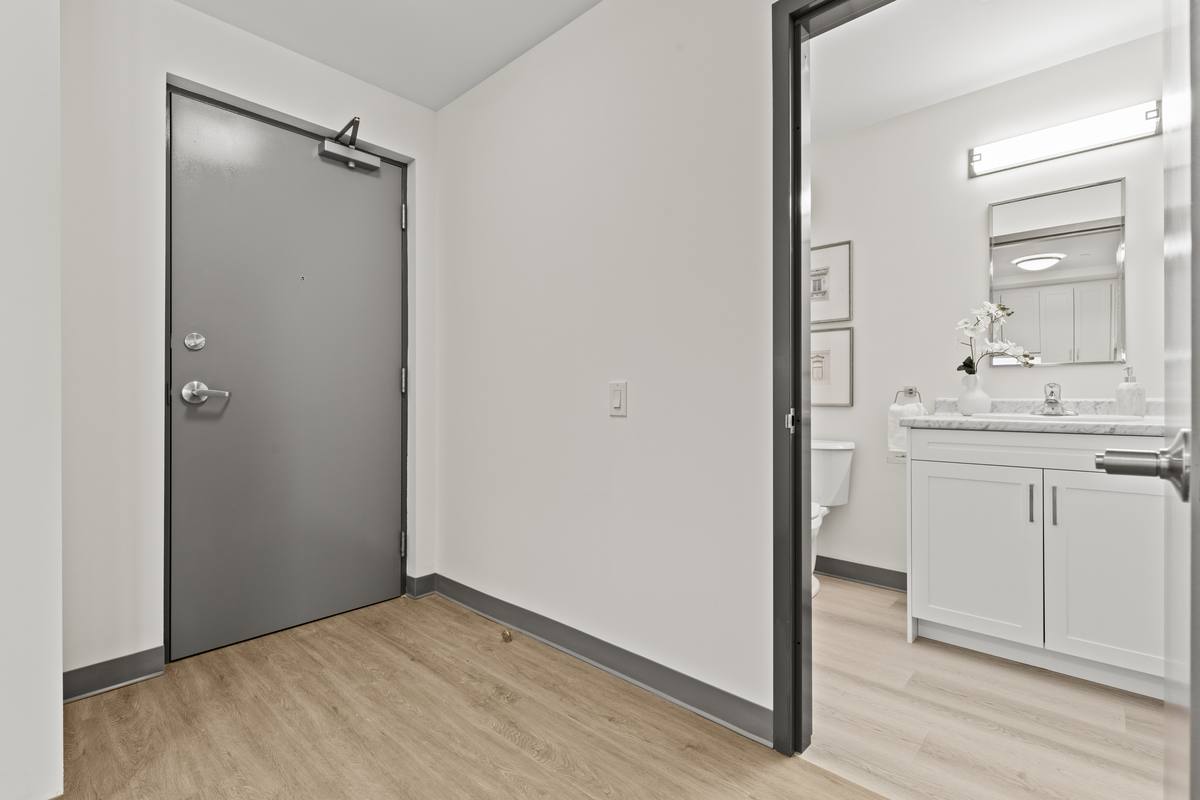 Suite entrance and bathroom in seniors apartment Thorold
