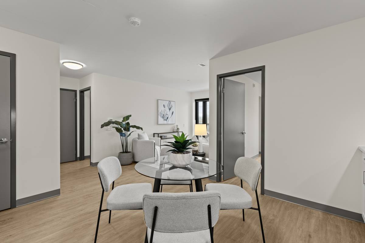 Open-concept living and dining area seniors rental Thorold